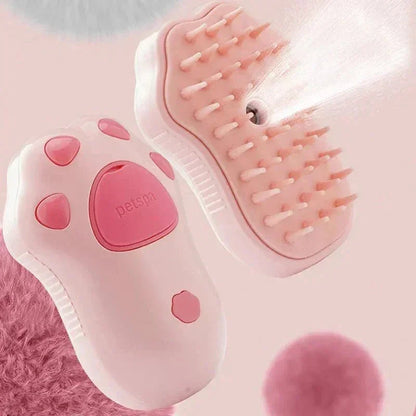 Pink paw-shaped pet grooming brush with water spray, ideal for cats and dogs